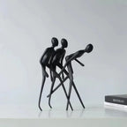 Human Sculpture Matte Black Iron Trio for Your Living Room